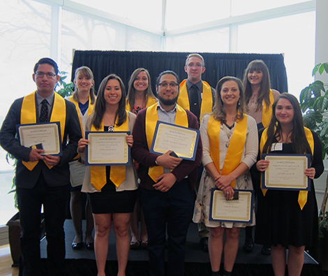 Upper Division Students holding certificates